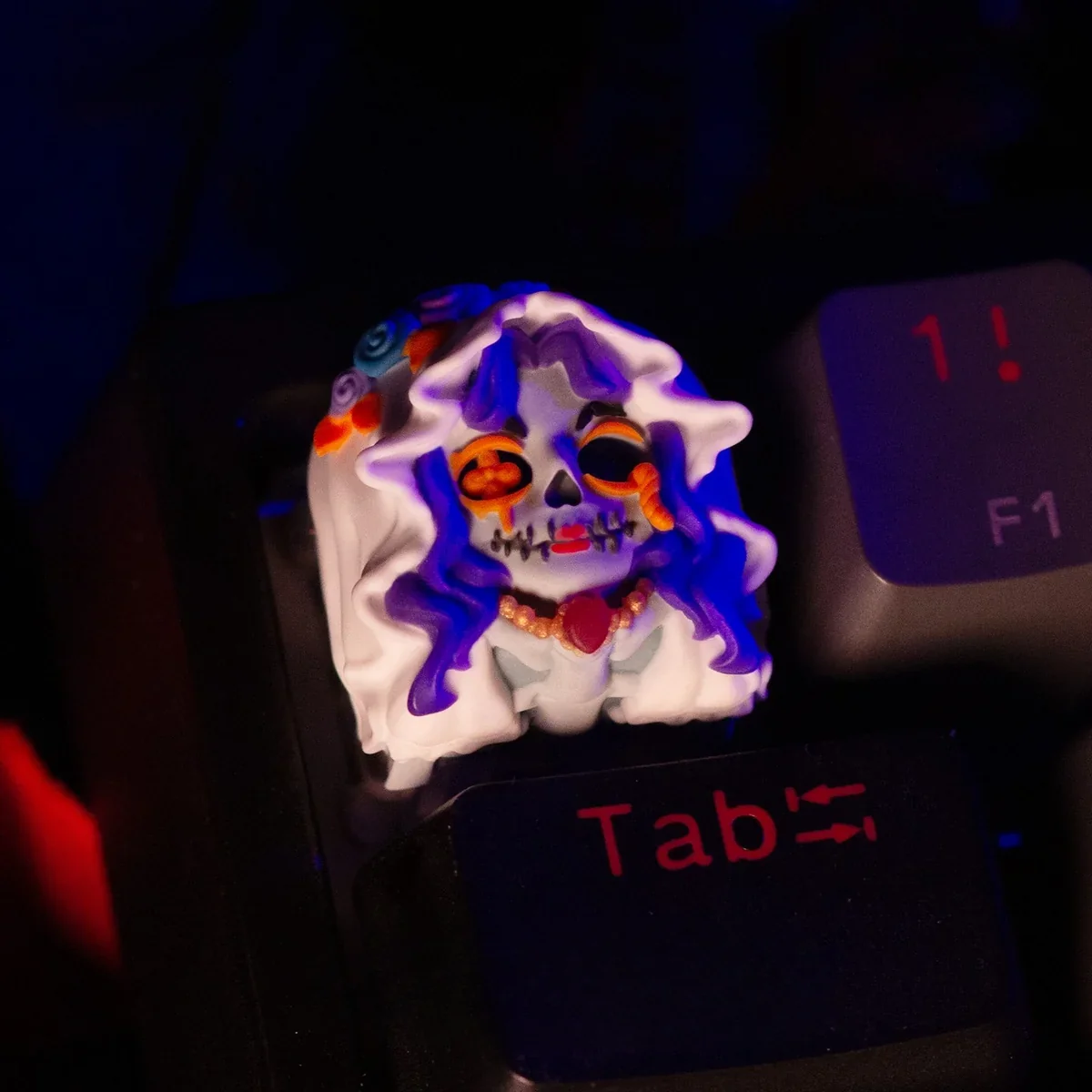 Detailed shot of the handcrafted texture and paintwork on the Zombie Bride & Groom keycaps.