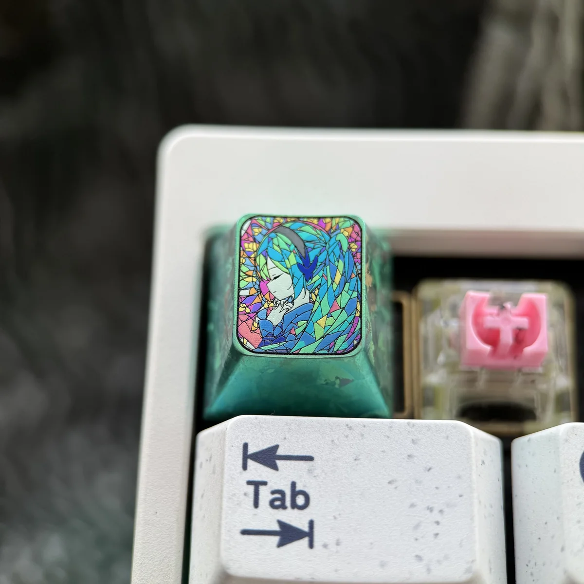 Hatsune Miku keycap installed on an ESC key position of a gaming keyboard setup