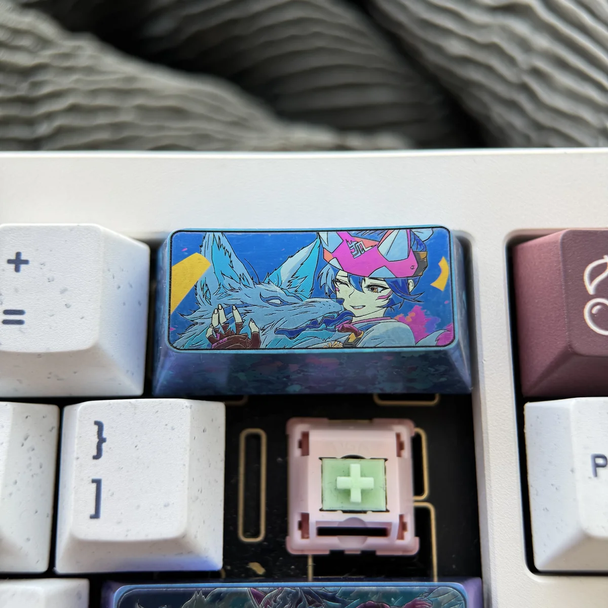 Side profile of Kiriko artisan keycap, showcasing titanium craftsmanship