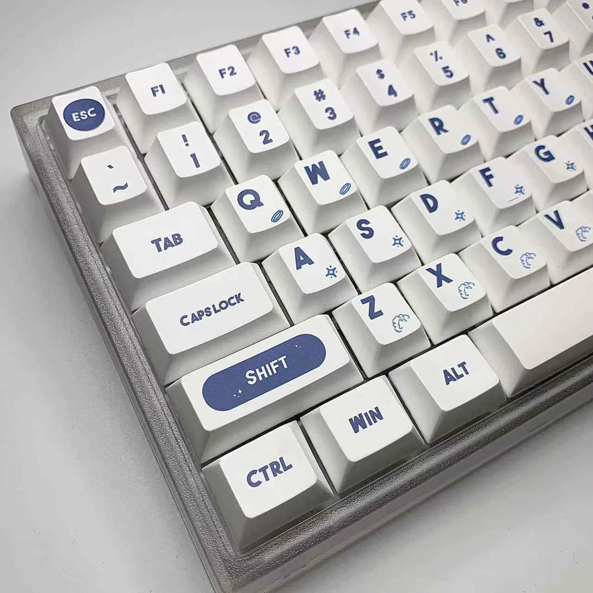 Close-up of NASA Astronaut themed PBT keycaps showcasing dye-sublimated legends.