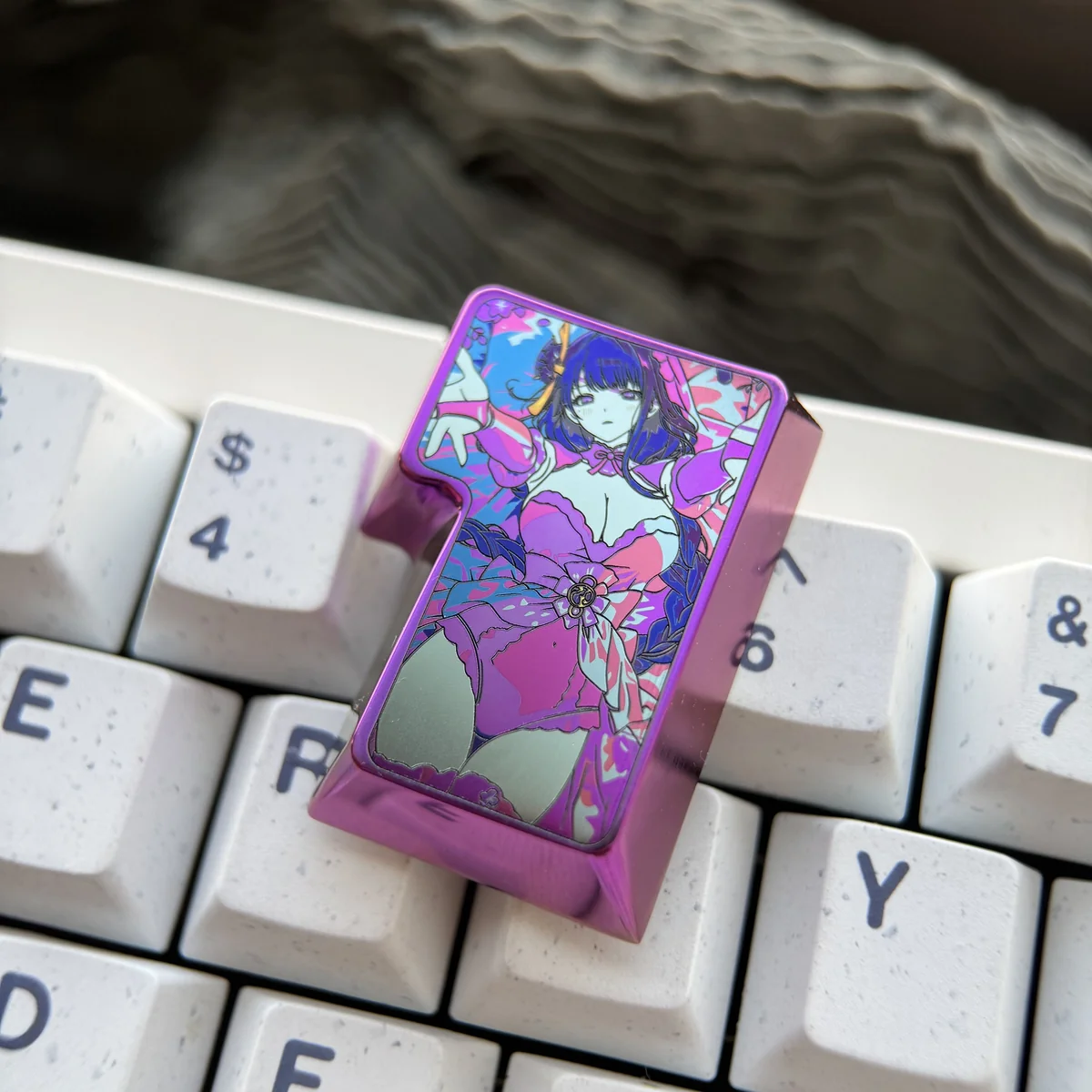 Close-up of Raiden Shogun artisan titanium keycap details
