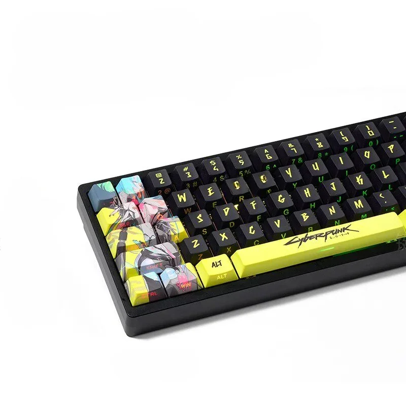 Close-up of Rebecca character keycap with vibrant neon accents and circuit patterns