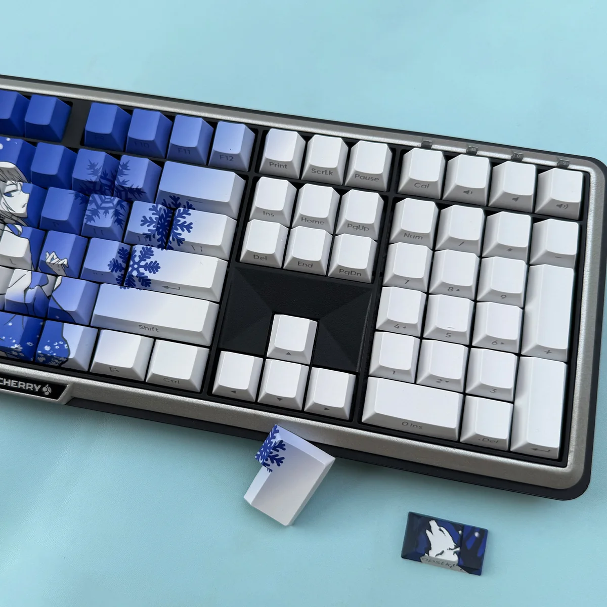 Overview of the 128-key Snow Wolf PBT set layout, demonstrating universal compatibility for various keyboard sizes.