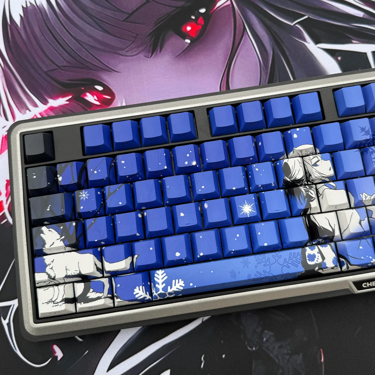 Close-up of Snow Wolf Cherry profile keycaps, highlighting the PBT texture and crisp side-engraved characters.