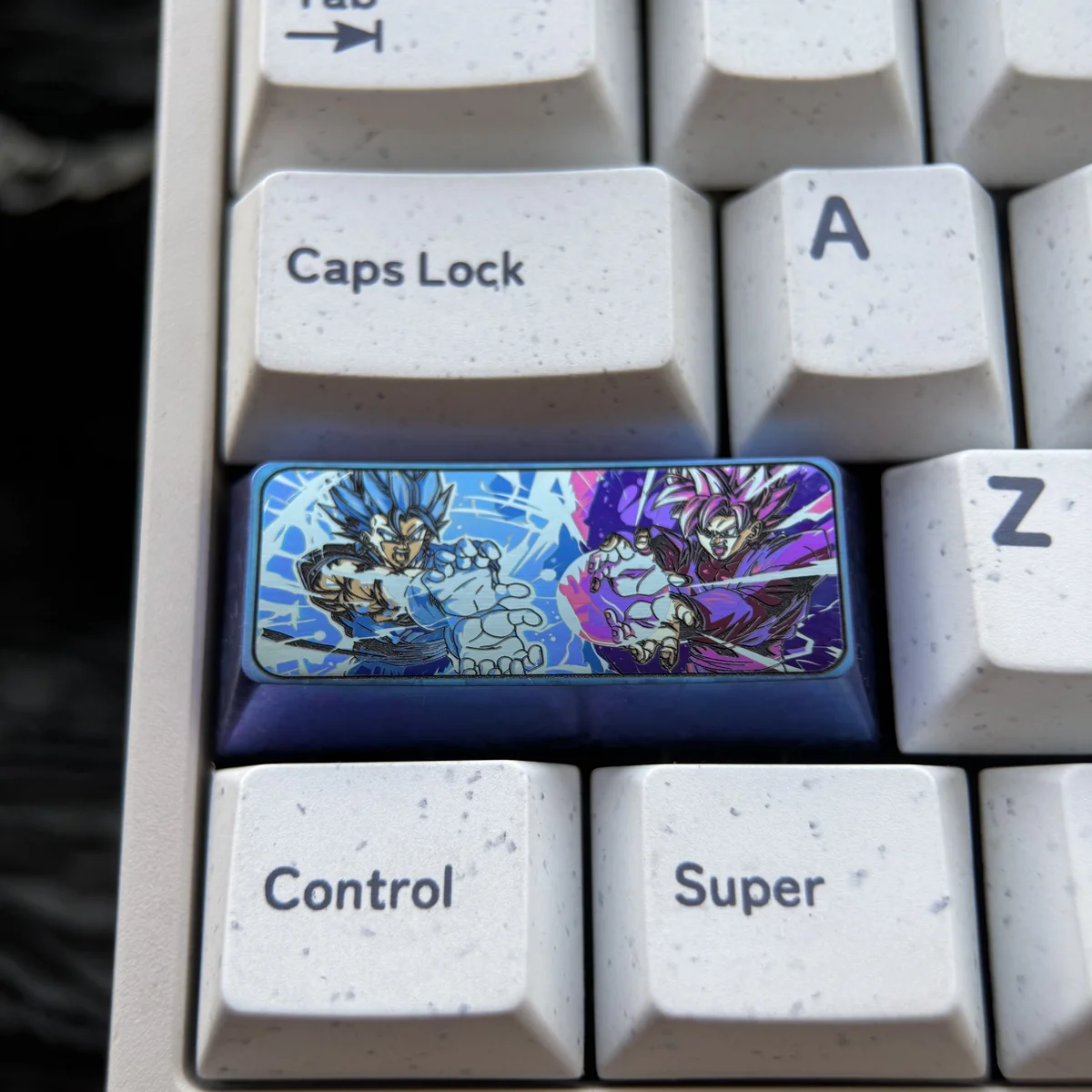 Close-up of CNC-machined Dragon Ball Z keycap