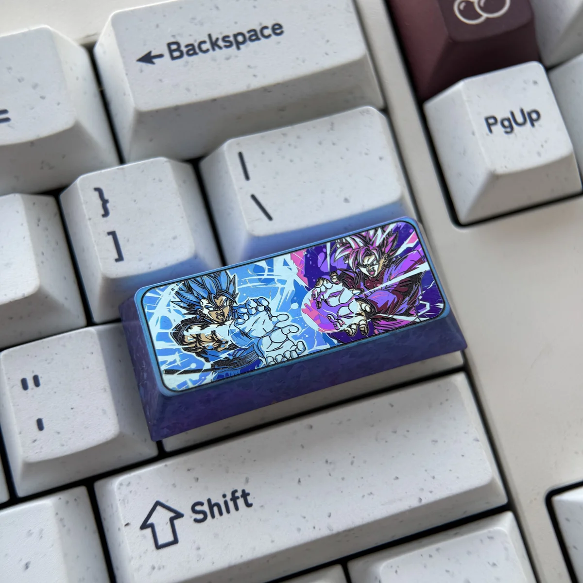 Side view of Goku and Vegeta keycap with OEM profile