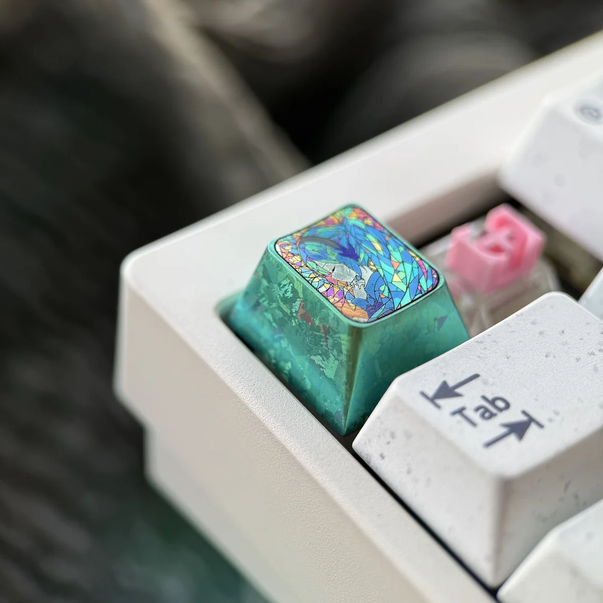 Top-down view of the Hatsune Miku artisan keycap showcasing its unique design