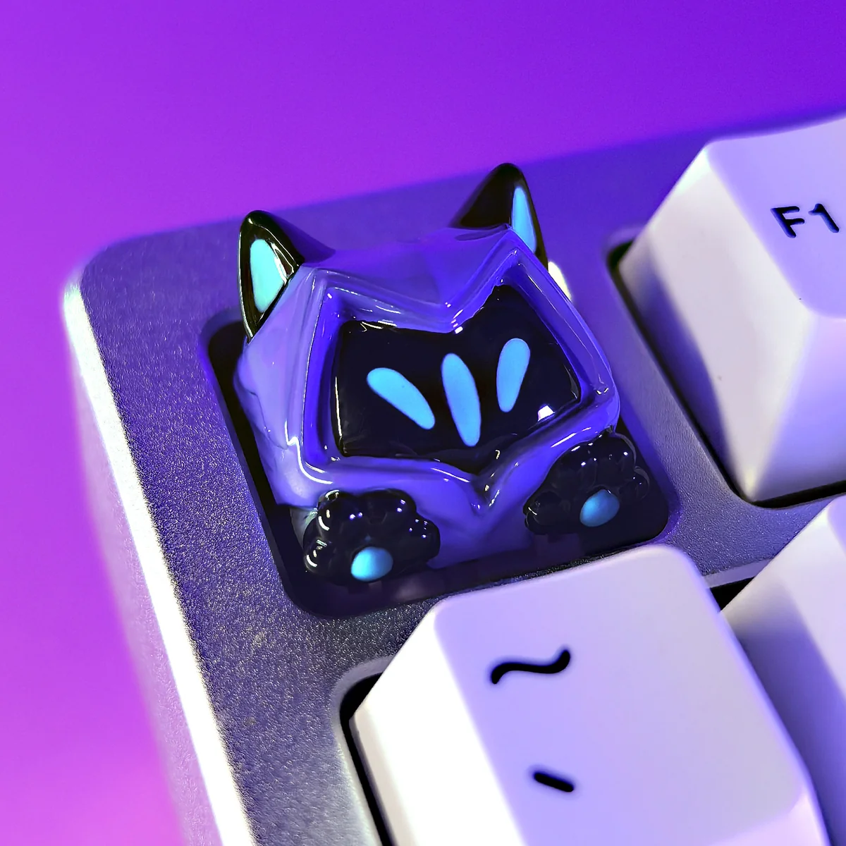 Angle view of Valorant Omen Cat Keycaps Valorant Omen Cat Ear & showing sculpt and color layering