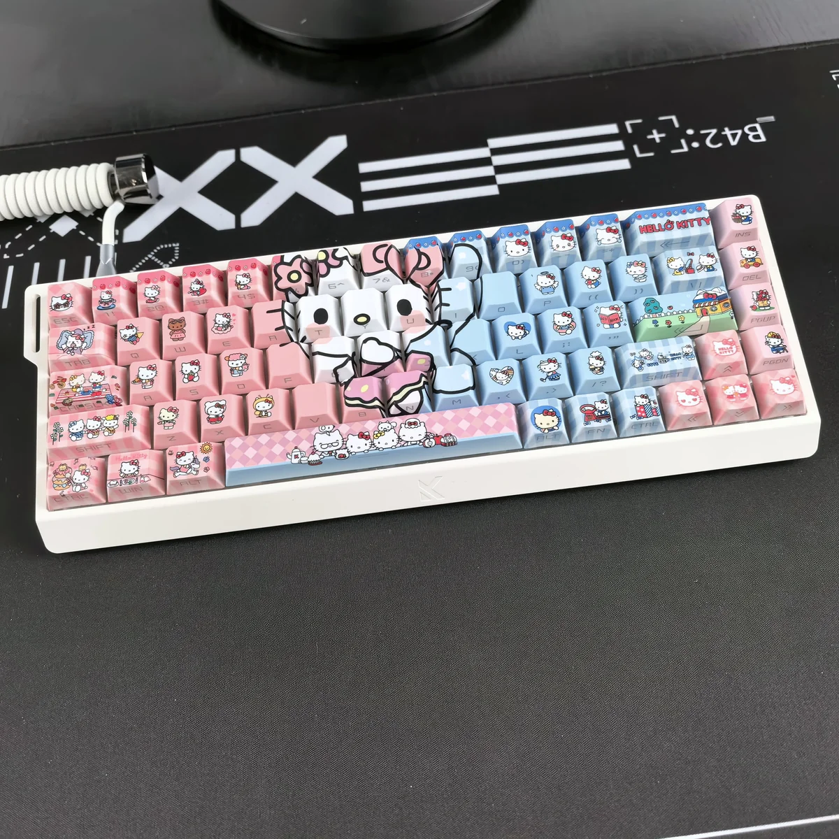 Hello Kitty character keycaps in a vibrant color-block design
