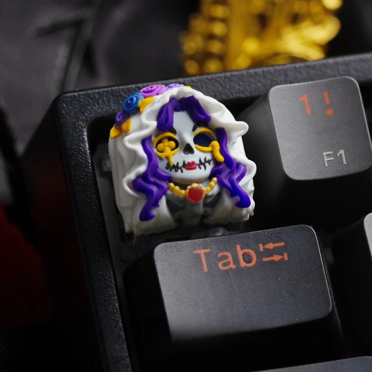 Zombie Bride & Groom keycaps installed on a backlit mechanical keyboard, emitting a spooky glow.