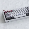Close-up of aluminum arcade joystick keycap on a keyboard