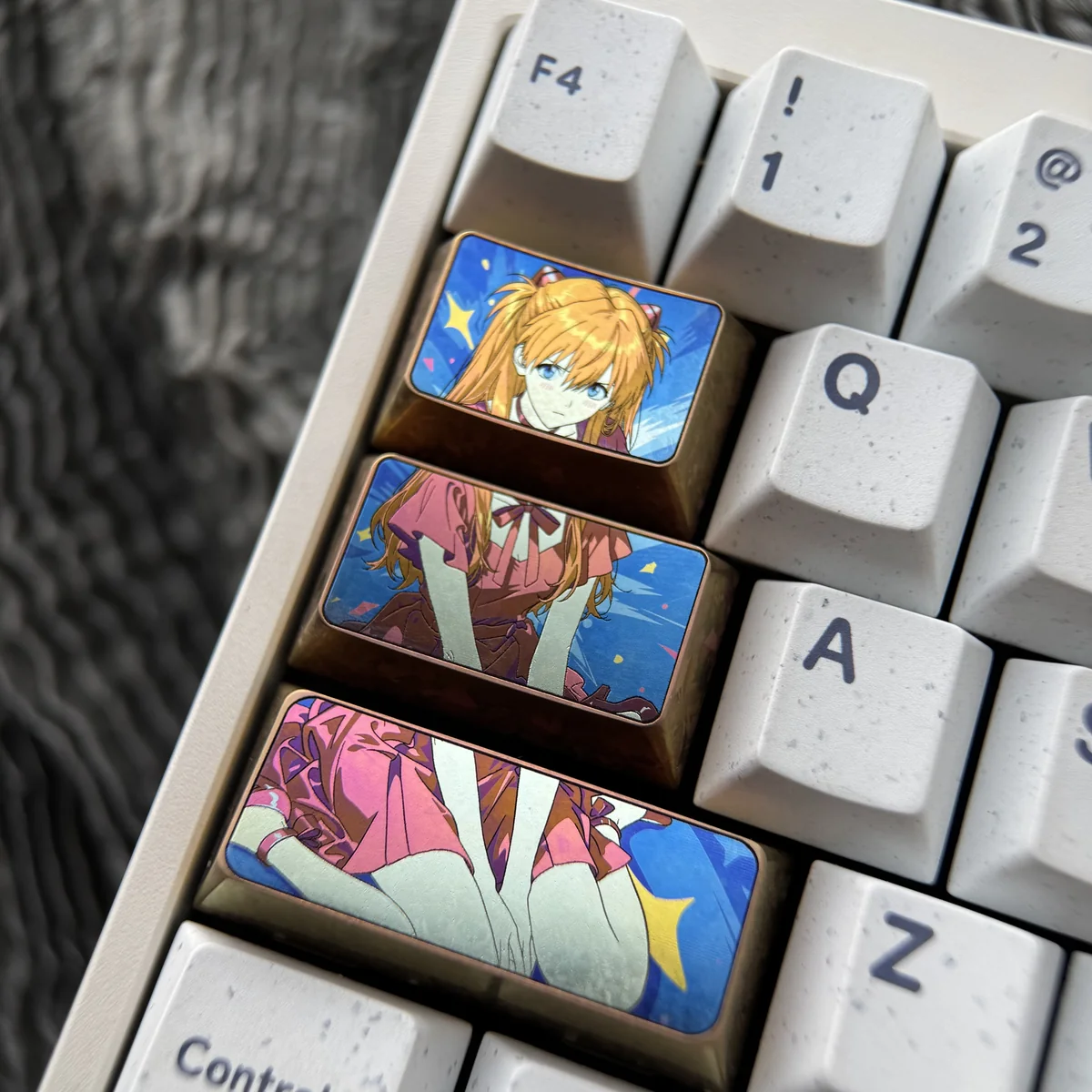 Close-up of vibrant Asuka design on metal keycap