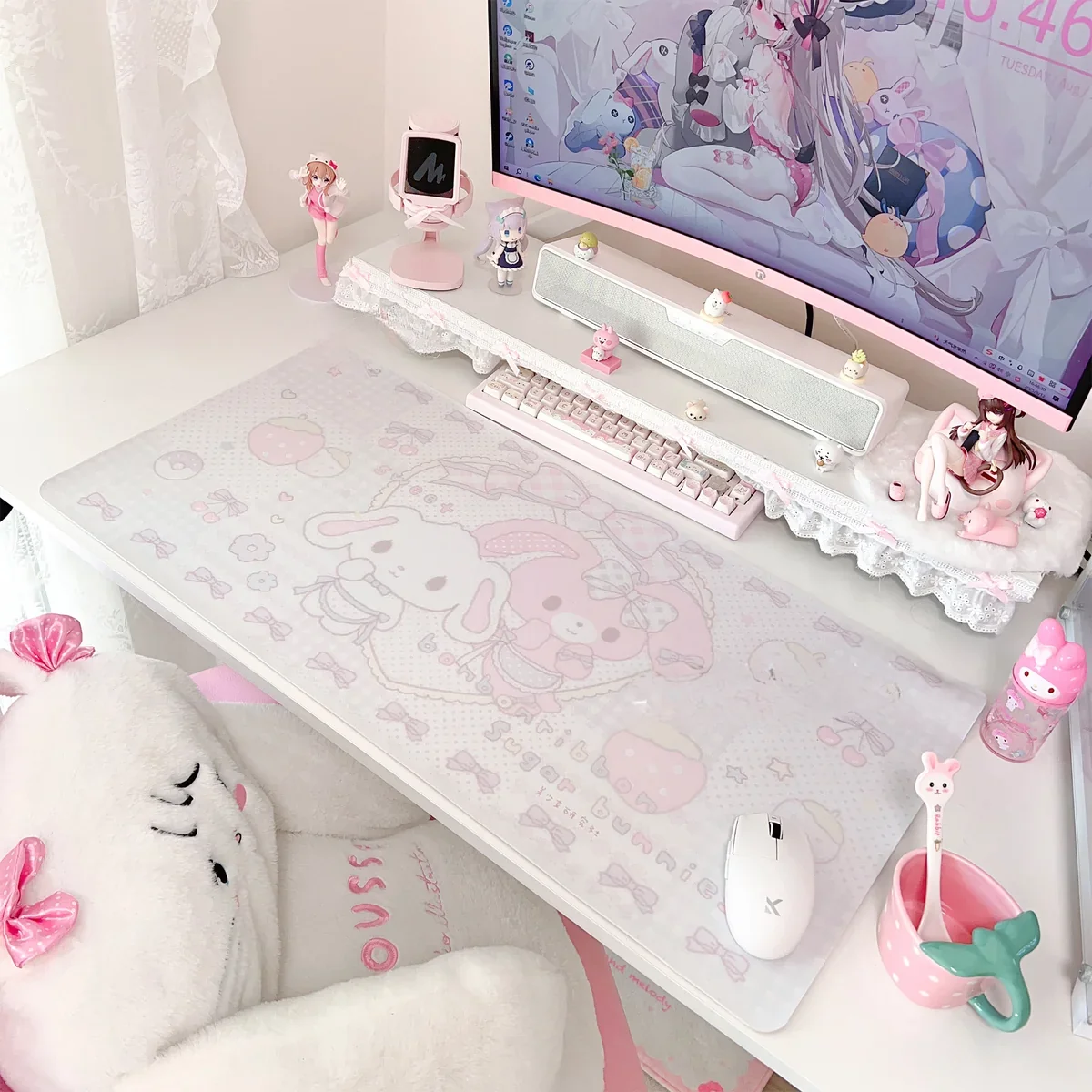 Close-up view of a accessories from the Bonbonribbon & Sugarbunnies Desk Mat showing the detailed kawaii rabbit design and pastel colors