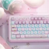 Bubble Kitten Keycap Set with playful bubble and paw print accent keys, arranged aesthetically.
