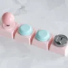 Hand holding an aluminum joystick keycap showcasing craftsmanship