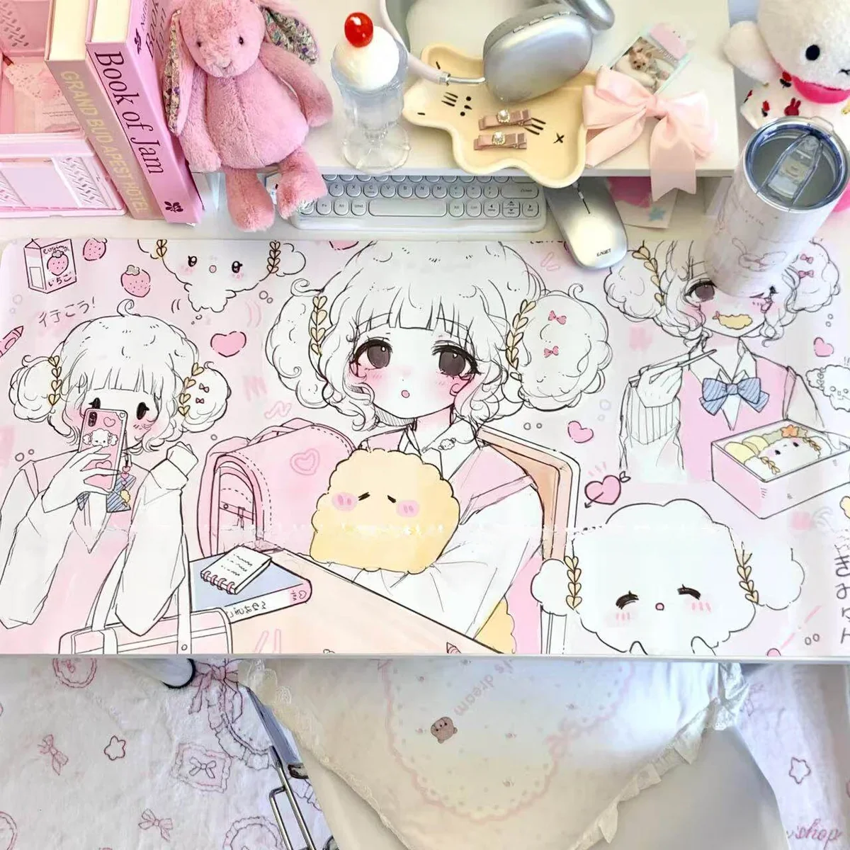 Close-up detail of a Cogimyun themed Desk Mat, highlighting pastel feel