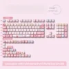 Cotton Candy Dream Keycap Set arranged on a desk with matching pastel accessories, creating a cohesive theme.