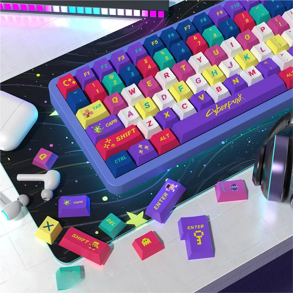 Detailed view of individual Cyberpunk 2077 themed keycaps, showcasing vibrant colors