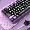 Side view of Dark Devil Cherry Profile keycaps demonstrating ergonomic angle and height.