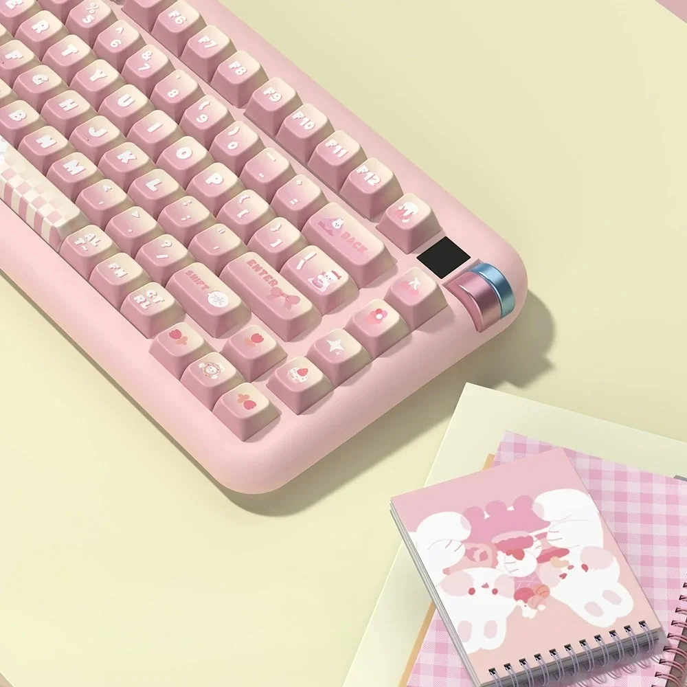Close-up of a keycap showing a cute dessert-themed rabbit illustration and PBT dye-sublimation detail.