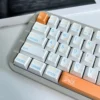 Close-up view of a Dynamic Storm keycap, highlighting the intricate dye-sublimated storm patterns and crisp legends.