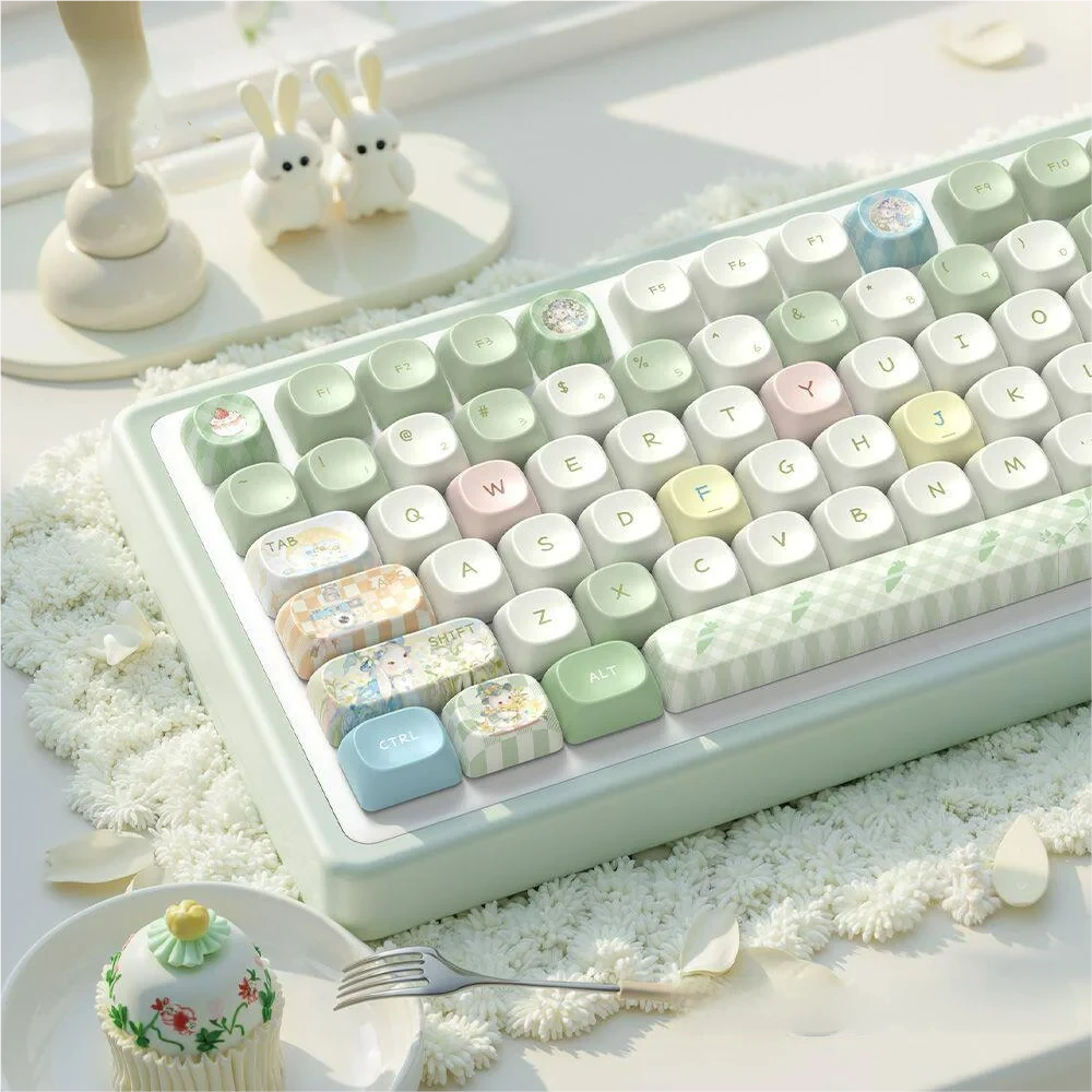 Side view of a keyboard with Picnic Bunny keycaps, highlighting the ergonomic MOA profile