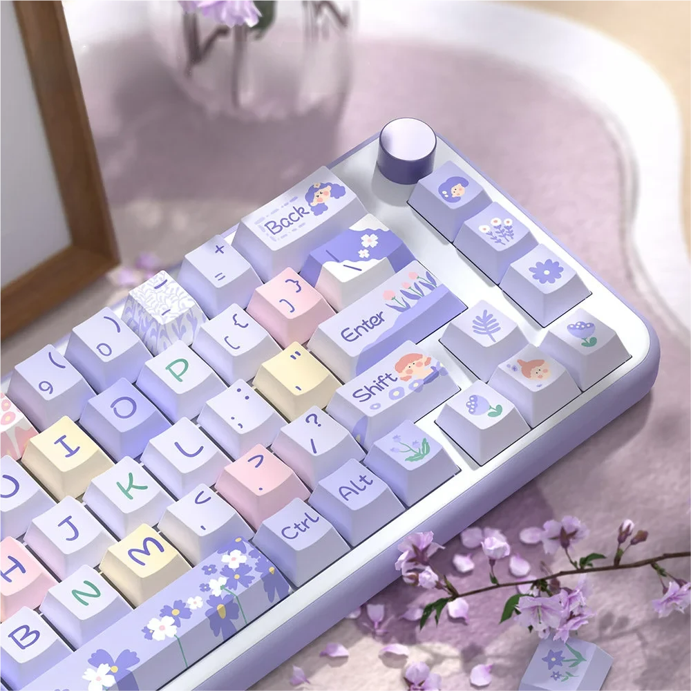 Arrangement of Floral Girl keycaps, displaying various key sizes and the cohesive whimsical garden theme.
