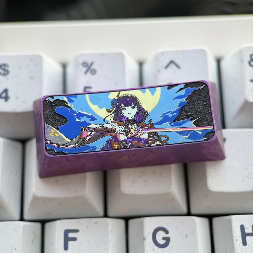 Artistic shot of the Raiden Shogun titanium keycap, emphasizing its collectible quality and Genshin Impact theme