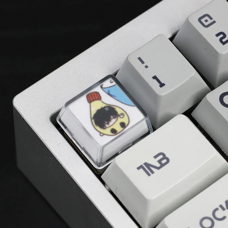 Side profile of Gintama resin keycaps, highlighting OEM profile and material texture