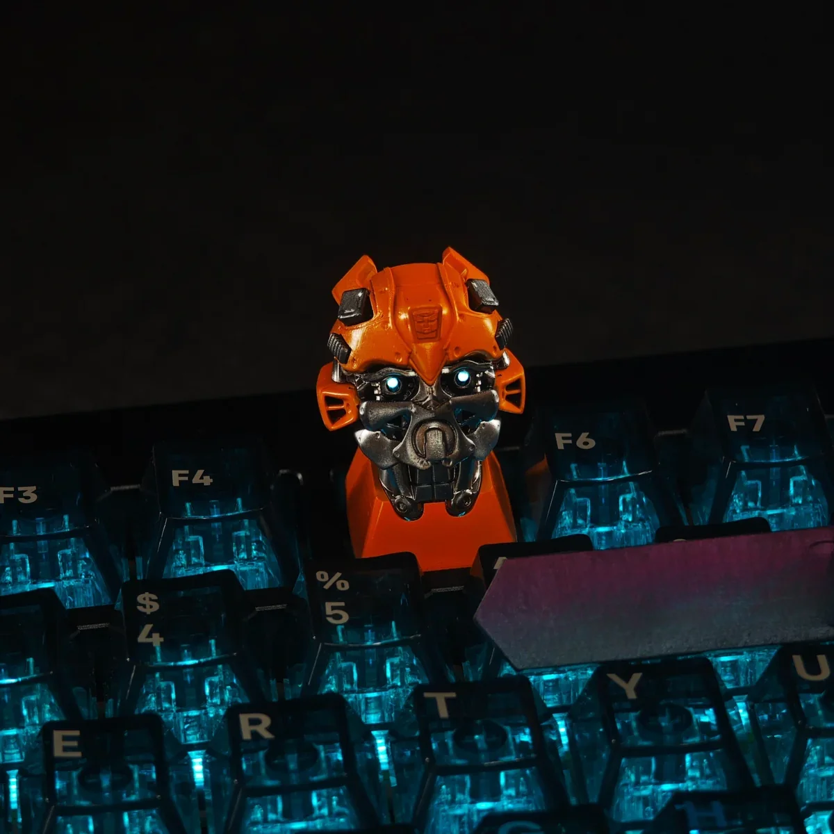 Detailed view of hand-sculpted Bumblebee keycap