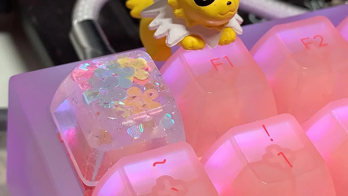 Close-up detail of the Luminous Floral Keycap, showcasing the intricate flower patterns and clear resin finish.