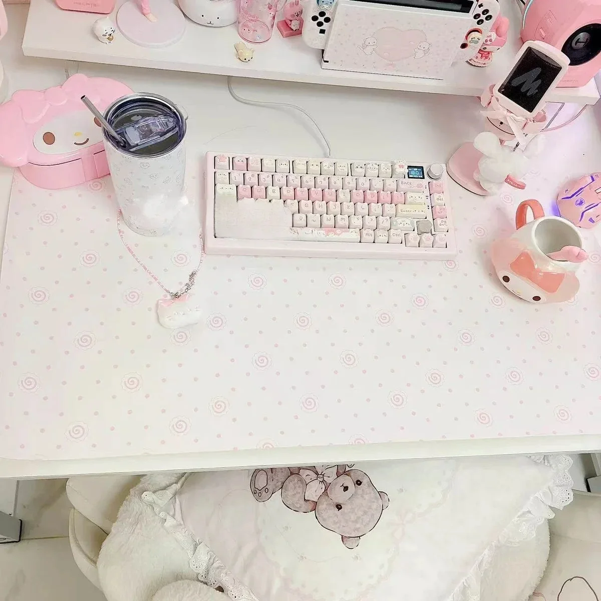 Close-up of Fish Cake themed desk mat with intricate Japanese design elements.