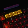 Macro shot of the laser-engraved poker suit details on the artisan keycap.