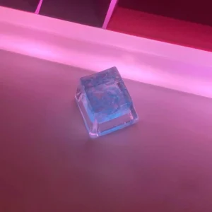 Detailed view of the "crushed ice" texture and internal crystal filling of a Lemon Ice Keycap.