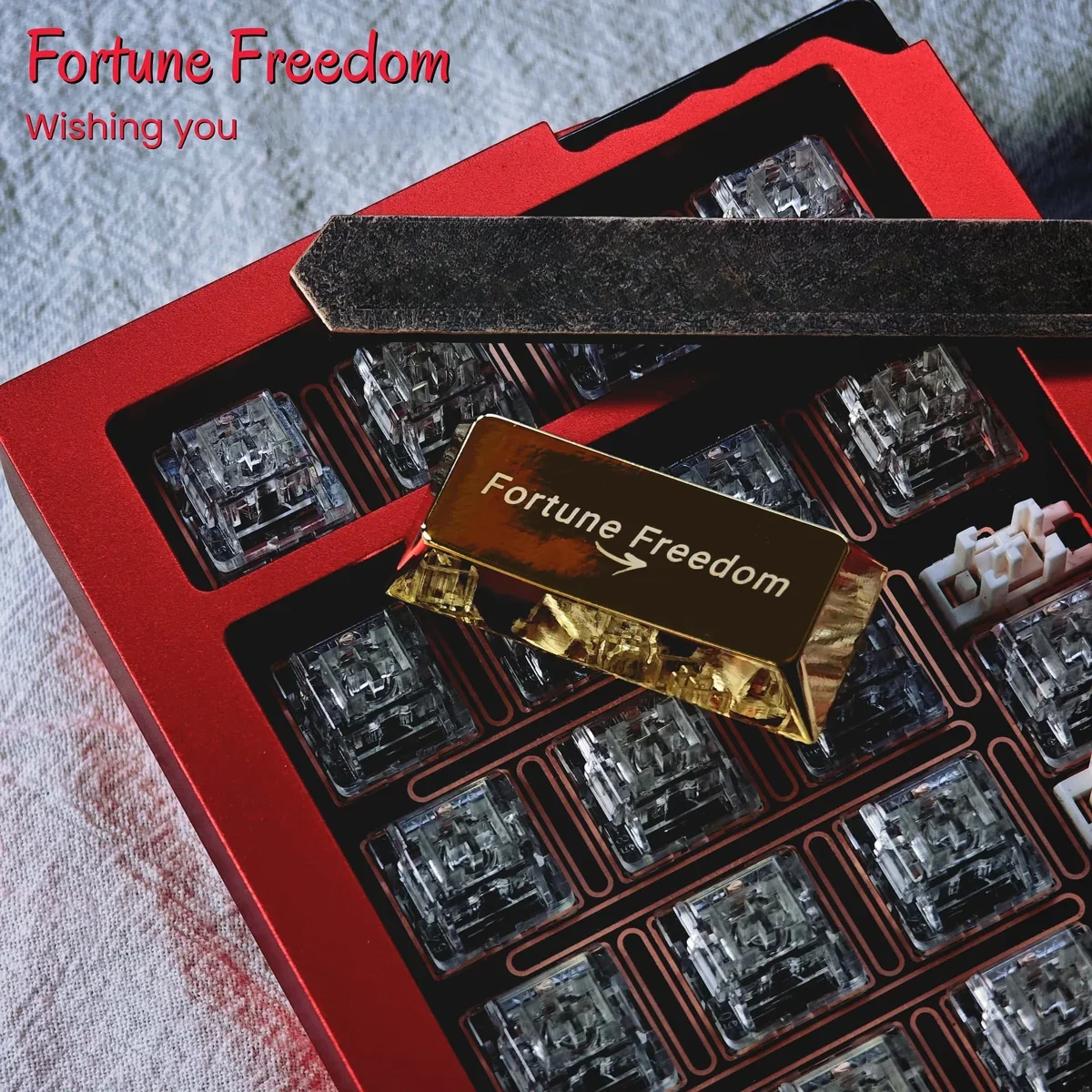 Close-up of the precision-crafted Fortune Freedom symbol on a metal keycap