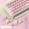 Side profile view of the MDA keycaps, highlighting their unique sculpted shape.
