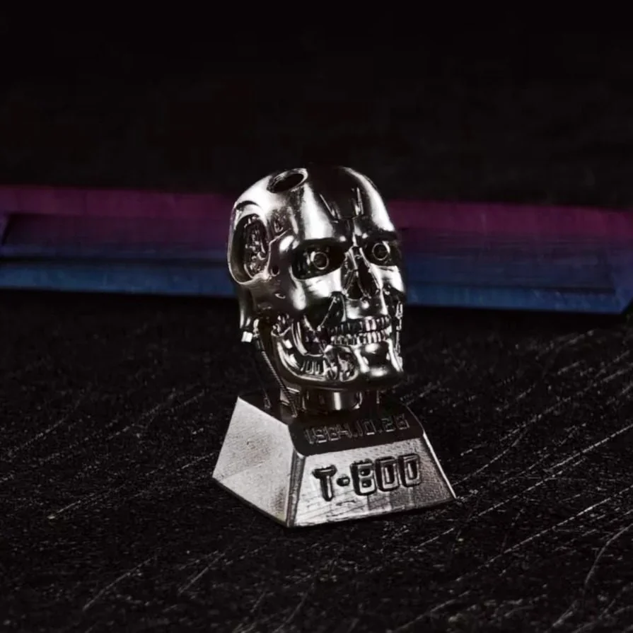 T-800 keycap from an elevated angle, showcasing metallic finish