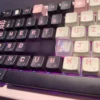Minimalist mechanical keyboard setup with Ethereal Wind artisan keycap