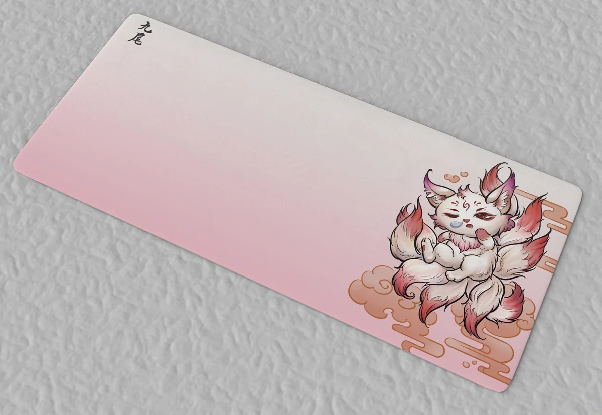 Stitched edges of Nine-tailed Fox desk mat for durability