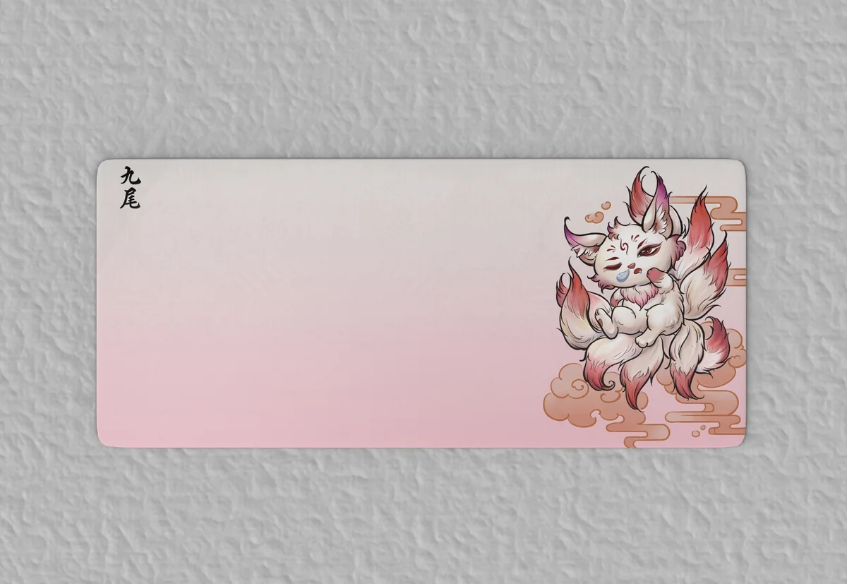 Waterproof test on Nine-tailed Fox desk mat showing liquid beading