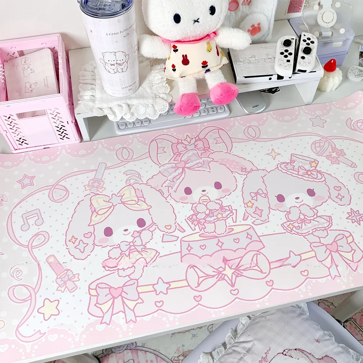 Close-up of pink bunny design on Desk Mat