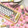 Side profile of Playful Dog Cherry profile keycaps, showing ergonomic curvature and PBT texture.