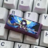 Close-up of the Raiden Shogun titanium keycap showcasing anodized details and Cherry profile