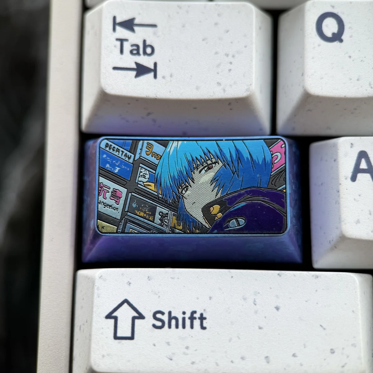 Rei Ayanami titanium artisan keycap on a mechanical keyboard