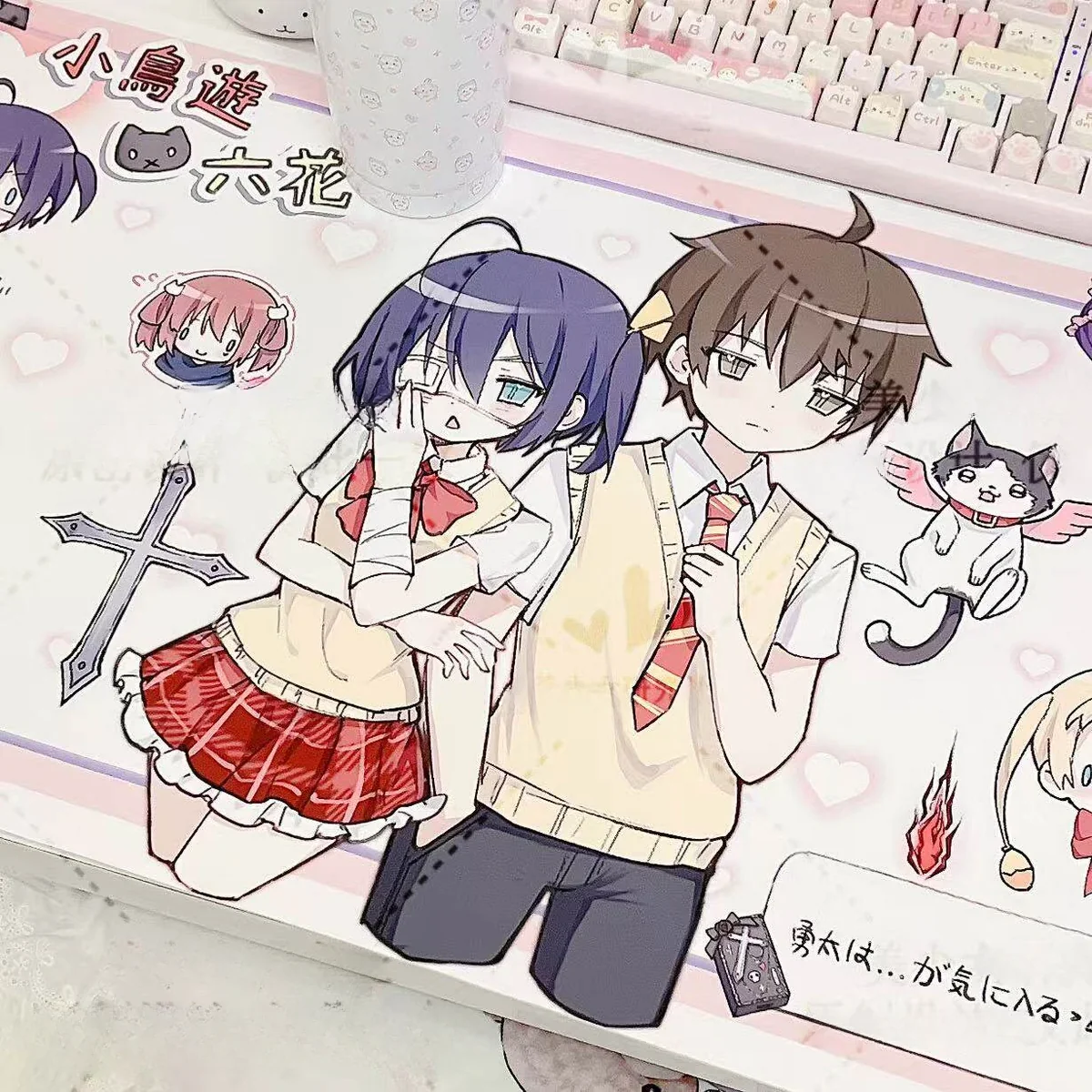 Close-up of Rikka Takanashi Desk Mat, highlighting artistic detail