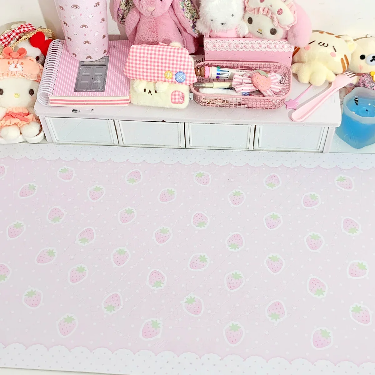 Macro shot of strawberry desk mat legend