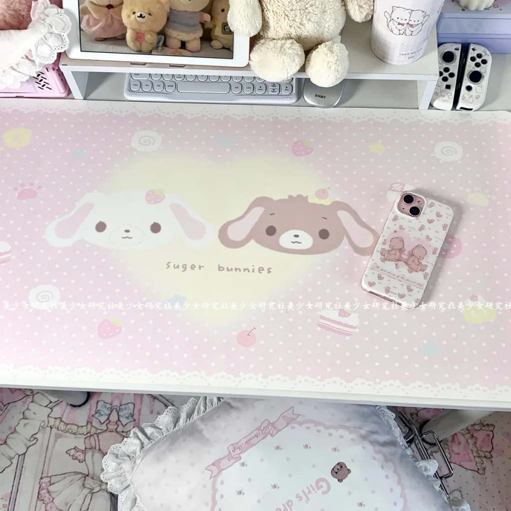 Sugarbunnies Dessert Kurousa Shirousa Desk Mat on a light desk with a keyboard and mouse