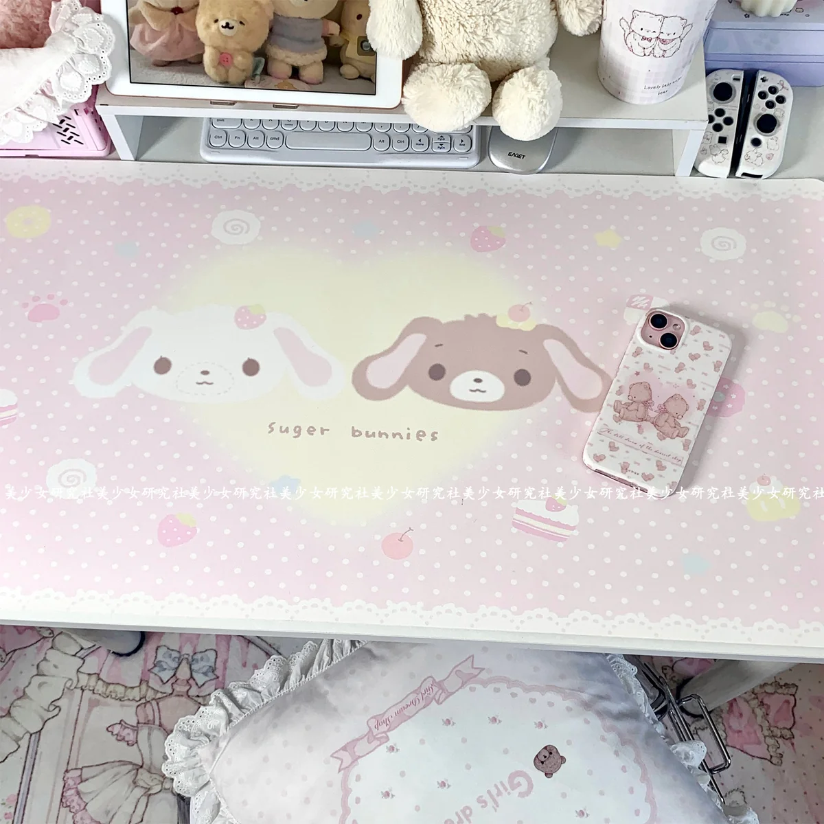 Sugarbunnies Dessert Kurousa Shirousa Desk Mat on a light desk with a keyboard and mouse