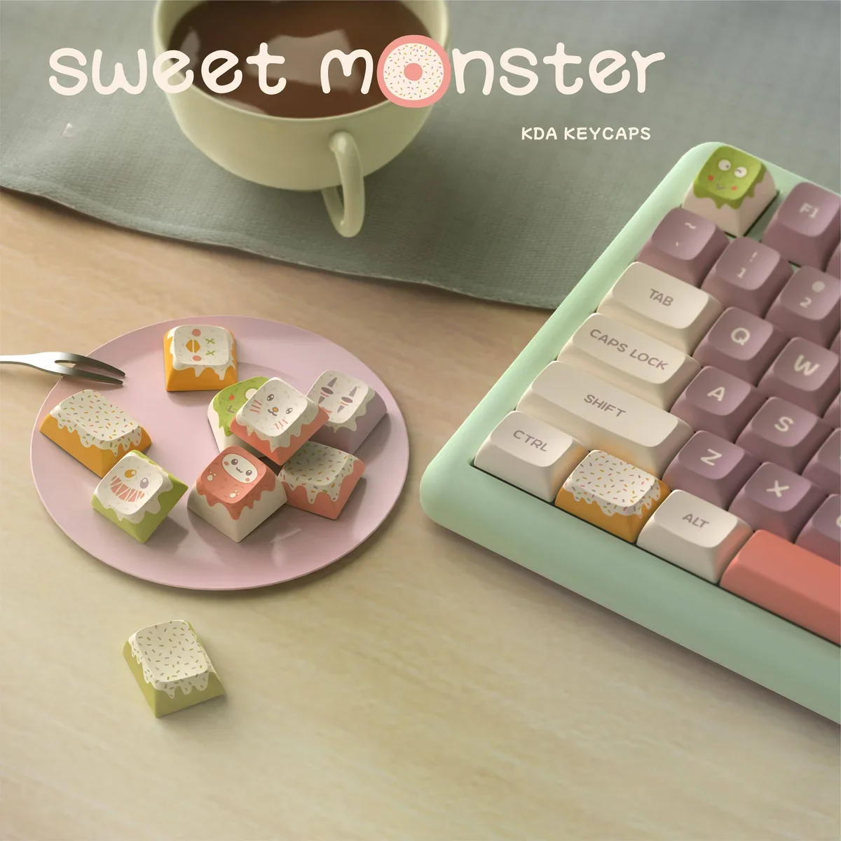 Close-up of Sweet Monster KDA keycaps showing vibrant colors and detailed monster designs