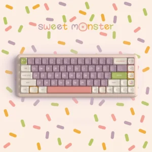 Sweet Monster KDA PBT Keycap Set with whimsical characters on a mechanical keyboard